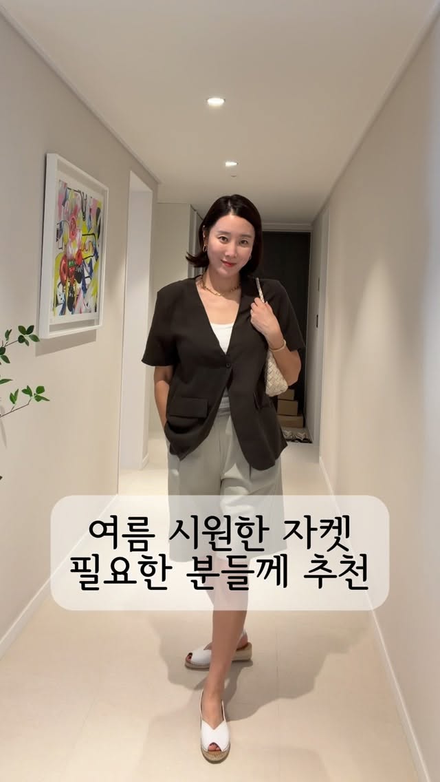 스톤 아일랜드 시그니처 와펜 하프집 바튼 니트